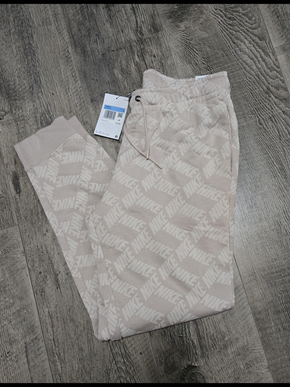 Nike Women's Beige All-Over Logo Joggers